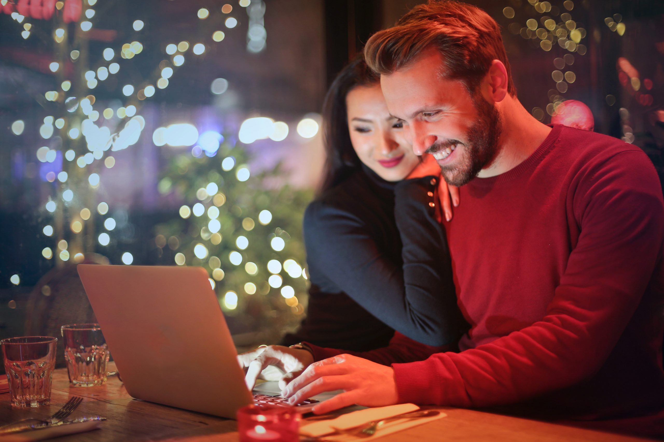 man and woman playing online