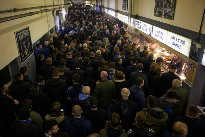 _crowded-stadium-concourse-with-fans-buying-food-and-drinks_