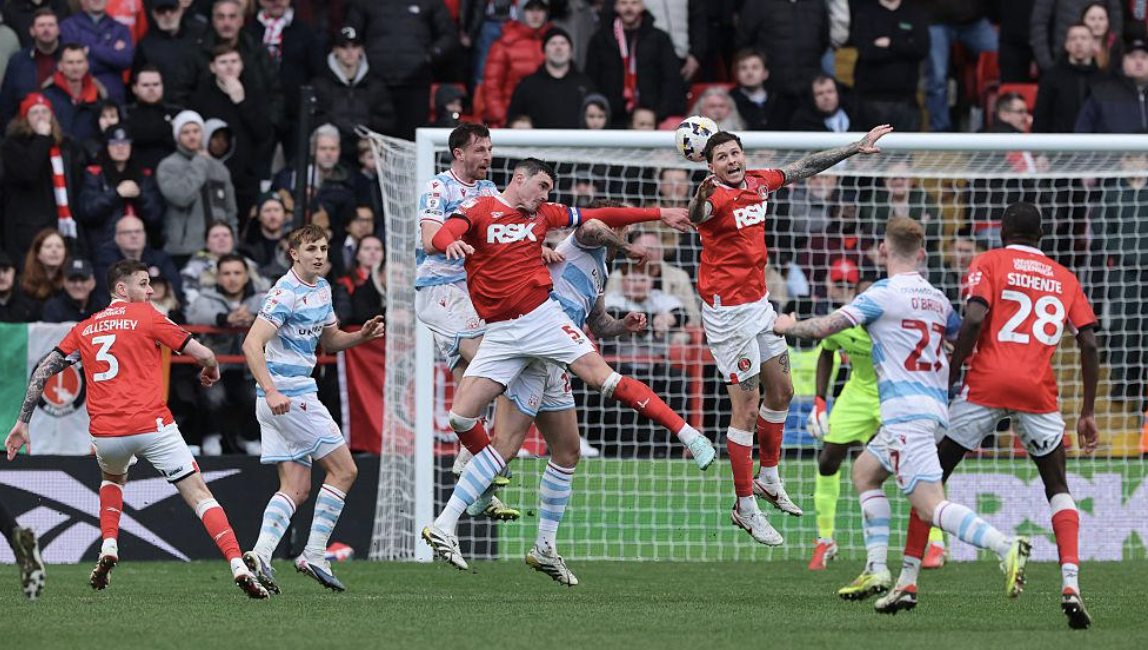 Charlton Athletic players competing in a Championship match