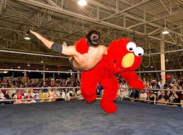 elmo+wrestling.jpg