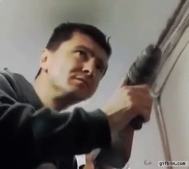 guy-slaps-self-with-power-drill.gif
